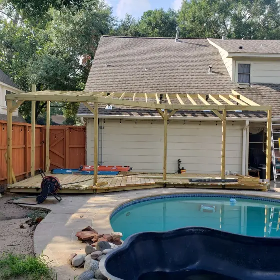 Poolside deck and outdoor structure — photo P231