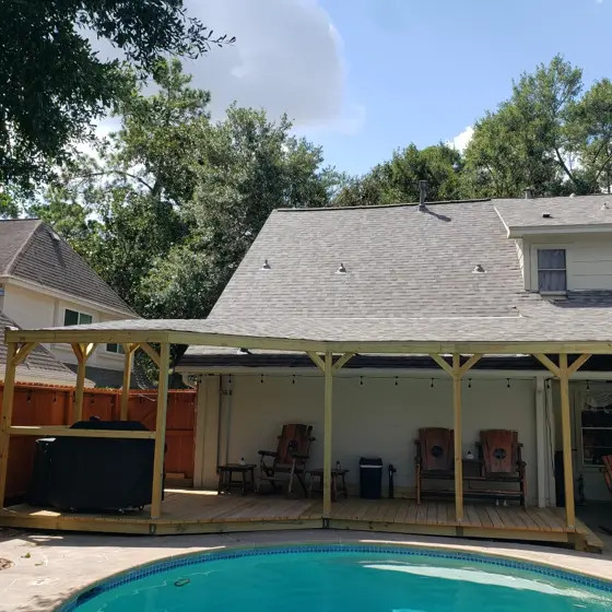 Poolside deck and outdoor structure — photo P232