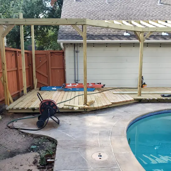 Poolside deck and outdoor structure — photo P233