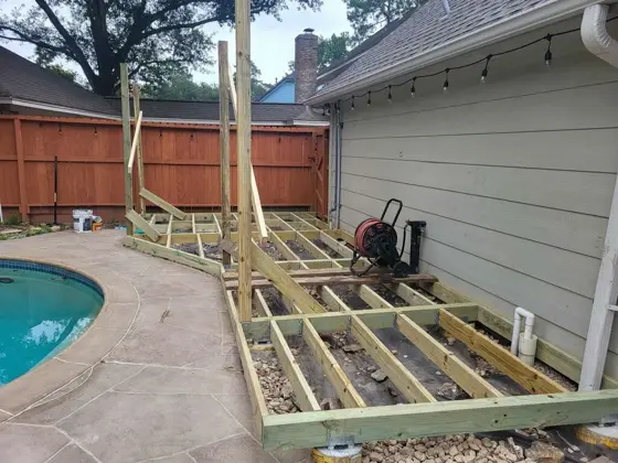 Poolside deck and outdoor structure — photo P235