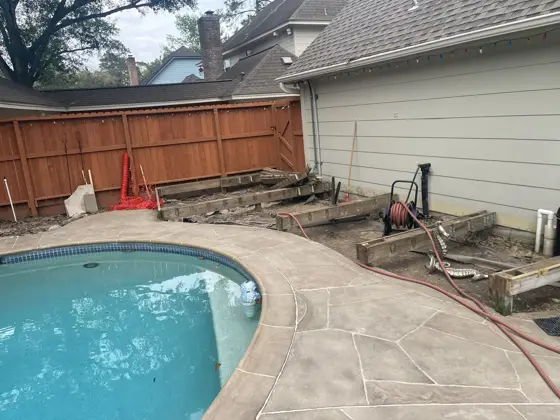 Poolside deck and outdoor structure — photo P256