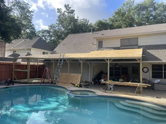 Poolside deck and outdoor structure — photo P277